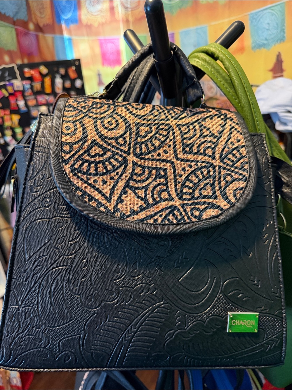 Black Embossed Backpack with Woven Pattern Flap